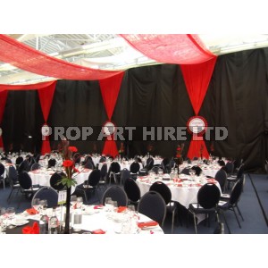 Velvet drapes in red with rosettes
